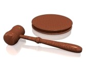 2516442-wooden-gavel-from-the-court-on-white-....jpg